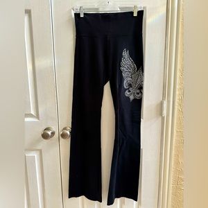 Ladies Black T-Party Size Large Leggings with Rhinestone Print on Leg.